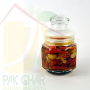 Pickles made of Red chilli, garlic ginger, card eat, leaves, black cumin seeds